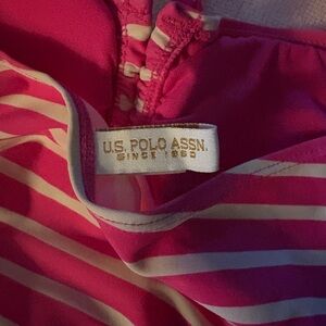 Four swim suits! Two are bikinis. Two are one piece!  One has wrap to match !